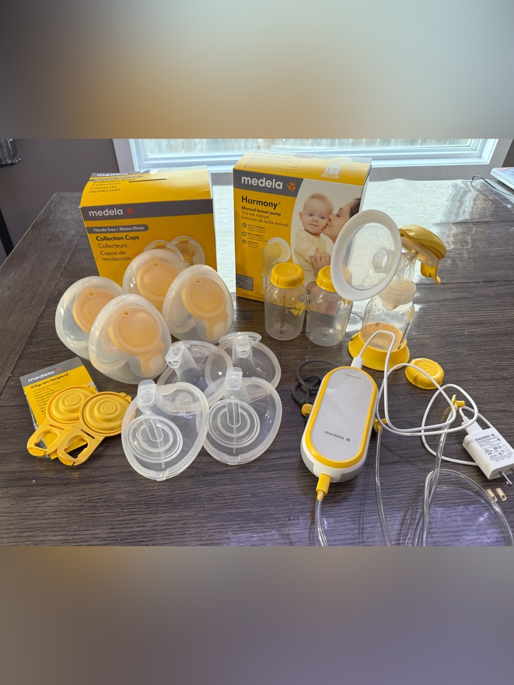 Medela Freestyle double electric Breast Pump & harmony manual breast pump